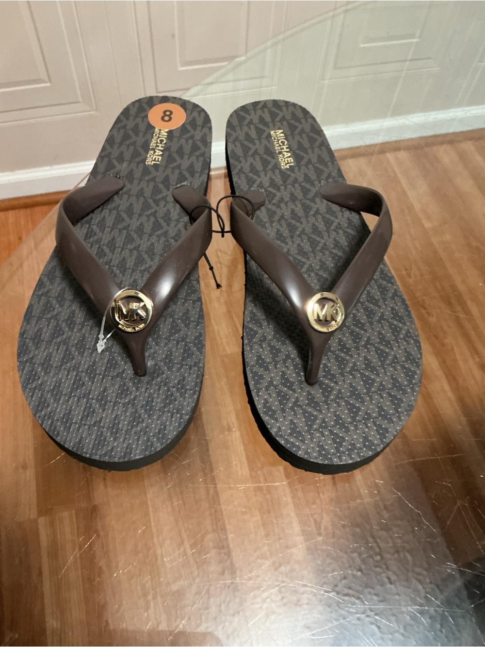 Brand New MICHAEL KORS Women’s Sz 8M Brown/Gold MK LOGO FOOTBED FLIP FLOPS